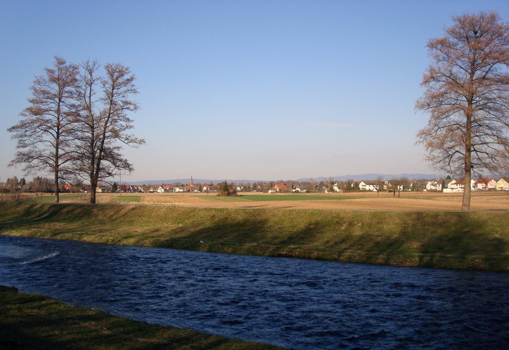 March-Buchheim, Blick ber die Dreisam auf den Ort in der Rheinebene, Mrz 2010