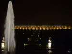 Das im Rokokostil errichtete Schloss Sanssouci bei Nacht.