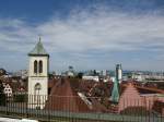 Freiburg, Blick von der neuerffneten Dachterrasse an der Kaiser-Josph-Strae ber die Dcher der Stadt Richtung West, am Horizont der Kaiserstuhl, links der Turm der Martinskirche, juni 2014