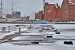 es wird langsam ungemtlich im Stralsunder Hafen,  Daisy  sammelt den losen Schnee zusammen und pustet ihn landeinwrts, 09.01.2010