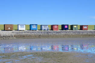 Badehuser bei Dagebll am Nordfriesischen Wattenmeer.