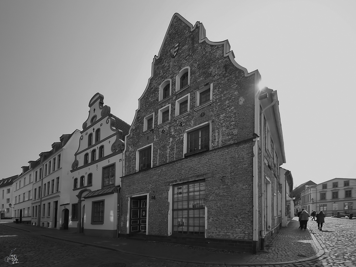 Alte Stadthuser in Wismar. (Mrz 2022)