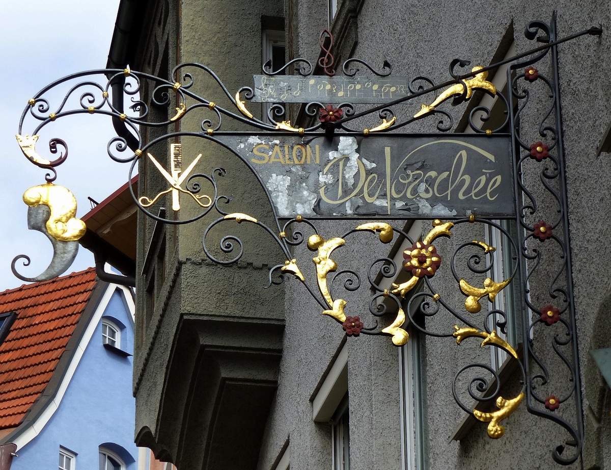 Fssen, Schild an einem Friseursalon, April 2014