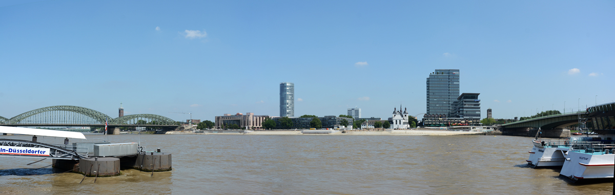 Kln - von links nach rechts: Hohenzollernbrcke, Hyatt-Hotel,  Triangel Hochhaus, (der kleine) St. Heribert neben dem LanXESS-Hochhaus, Deutzer Brcke - 31.07.2014