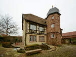 Ein Fachwerkhaus mit Turm in Diedesfeld.