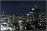 Die Skyline der Downtown von Vancouver bei Nacht, aufgenommen aus dem Blue Horizon Hotel.