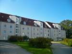 Dieses Bild zeigt einen der beiden Gebudekomplexe im Wohnpark  Am Blankenburger Tor  von der Hauseingangsseite.