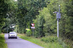 Die Kraftfahrzeugkennzeichen von Autos werden automatisch gescannt, wenn sie die dnisch-deutsche Grenze passieren.