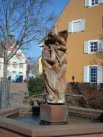 Kirchzarten im Schwarzwald, der Narrenbrunnen mit Figuren der allemanischen Fasnet wurde 1985 errichtet, Mrz 2011