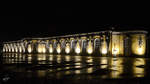 Das im Rokokostil errichtete Schloss Sanssouci bei Nacht.