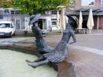 Zwei Brunnenfiguren auf dem Hirschlandplatz in Essen.