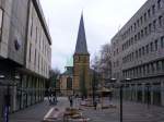 Der Blick vom Kennedyplatz in Essen zur Kettwiger Strae mit der Kirche am Burgplatz - 22.