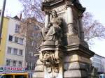 Steinfiguren an einem Brunnen auf dem  Alten Markt  in Kln, 17.