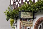 Schilder der Alten Weinstube in Ernst an der Mosel.