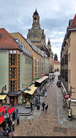 Blick auf die Mnzgasse in Dresden, hinter der sich die Frauenkirche und der Rathausturm anschlieen.