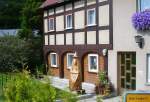 Umgebindehaus in Bertsdorf mit Holzfigur R�bezahl