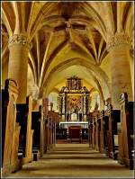 Der Innenraum einer der ltesten Kirche Luxemburgs, der Kirche von Rindschleiden.