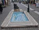 W�rthersee-Manndl-Figur mit Brunnen am Dr.