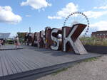 Gdansk / Danzig, Werbeschild und Riesenrad im Olowianka Park (02.08.2021)