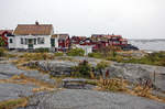 Holzhuser af der Insel Kringn im westlichen Schweden.