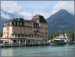 Interlaken im Kanton Bern, Schweiz, aufgenommen am 17.07.2010 an der Aare gegenber dem Hotel Du Lac.