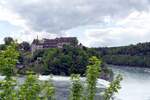 LAUFEN-UHWIESEN (Kanton Zrich), 12.05.2023, Blick auf Schloss Laufen (ber den Rhein von der zum Kanton Schaffhausen gehrenden Rheinseite)