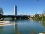 Basel, die Birs von links kommend mndet hier in den Rhein, dahinter die Schwarzwaldbrcke und der neue Roche Tower, April 2015