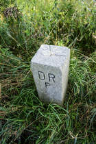 Grenzstein an der deutsch-dnischen Grenze bei Ellund-Ost. DRP steht fr Deutsches Reich Preuen. Aufnahme: 28. Juli 2023.