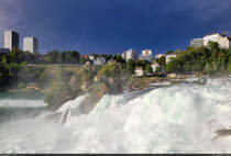 Umgeben von Hochhusern, flieen gewaltige Wassermassen den Rheinfall in Neuhausen (CH) hinunter. Nach heftigen Regenschauern blinzelte die Sonne kurz durch die dunklen Wolken.

🕓 28.7.2023 | 18:41 Uhr