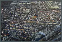 Die Stadt Sch�nebeck entstand 1932 durch Zusammenschluss dreier Orte. Im S�dwesten liegt der Stadtteil Bad Salzelmen, der wiederum selbst durch den Zusammenschluss der zwei Orte Gro� Salze und Elmen. Rund um die Kirche St. Johannis sind Teile des alten Ortskerns von Gro� Salze erhalten geblieben. Am unteren Bildrand ist der Kurpark zu sehen. N�rdlich an Bad Salzelmen schlie�en sich verschiedene Neubaugebiete an. (20.01.2024)