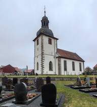 Geisa - Spahl: Kirche St. Cyriakus im Mrz 2023. Der Turm stammt aus dem Jahr 1504 und wurde 1514 vollendet, das Kirchenschiff wurde zwischen 1720 und 1724 erbaut.