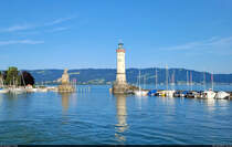 Lwe und Leuchtturm sumen die Hafeneinfahrt von Lindau. Die Berge im Hintergrund gehren bereits zu sterreich.

🕓 30.7.2024 | 18:56 Uhr