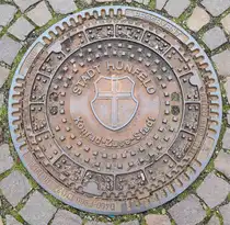 Kanaldeckel der KONRAD-ZUSE-STADT H�NFELD, 12-2024