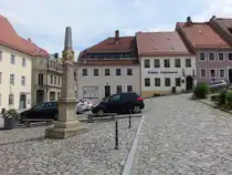 Stolpen, Postmeilens�ule von 1728 am Marktplatz (05.06.2025)