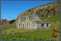 Ein altes Wohnhaus steht in der Siedlung Tangasdal im Westen von Barra. (09.05.2025)