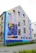 Wandmaleriei im Innenhof der Gro�en Stra�e 50 in Flensburg. F�r sein Projekt arbeitete der D�ne Peter Birk mit der Natur Flensburgs und der maritimen Geschichte der Stadt. Die Wandmalerei ist ein Teil der Nord:Syd Freiraumgalerie Flensburg. Aufnahme: 26. Juli 2026.