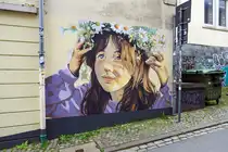 Wandmalerei des Flensburger K�nstlers Kim Grabow am Heiligengeistgang in Flensburg. Das Kunstwerk ist ein Tel der Nord:Syd Kunstraumgalerie in der Flensburger Innenstadt. Aufnahme: 26. Juli 2026.