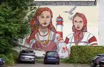 Wandmalerei vom K�nstler Bjoern von Schulz. Das Kunstwerk ist ein teil des Nord:Syd Freiraumgalerie in der Flensburger Innenstadt und befindet sich am Parkplatz hinter Caf� Extrablatt in der Gro�en Stra�e 61. Aufnahme: 26. Juli 2026.