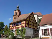 Buckow, Fachwerkhaus und evangelische Kirche in der K�nigstra�e (23.05.2026)