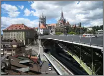 Die Pont Bessire mit der Kathedrale von Lausanne im Hintergrund (25.07.2009). Eine sehr interessante Brcke; oben der Straenverkehr, eine Etage tiefer die Mtro Lausanne.