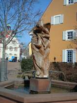 Kirchzarten im Schwarzwald, der Narrenbrunnen mit Figuren der allemanischen Fasnet wurde 1985 errichtet, Mrz 2011