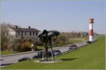Die kleine Ortschaft Krautsand auf der gleichnamigen Elbinsel. Vor dem Deich gibt es einen Sand- und Badestrand. 18.04.2011