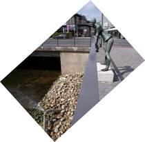  Der Spezialist  begutachtet den Rohrbruch an der Wittekindstrae in Osnabrck. Er wurde vom Bildhauer Hans Gerd Ruwe (1926 - 1995) geschaffen. 10.09.2011