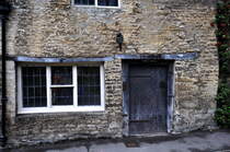Castle Combe-Grafschaft Wiltshire, Sdwestengland.  A C H T U N G  ! Tolles Puzzle im Internet von dieser Tr auf        www.jigidi.com/solve.php?id=QT6G1UCZ    zufllig entdeckt.
  
Das Corbett Cottage in The Street, so der offizielle Name, auf der Westseite der bekanntesten Strasse in Castle Combe. PS. Ich habe leider 31 Minuten fr das Puzzle gebraucht, ihr schafft das sicher viel schneller. 28.8.2009