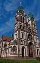 Freiburg im Breisgau, die Herz-Jesu-Kirche mit den markanten Doppeltrmen, im Stadtteil Sthlinger, Mrz 2012