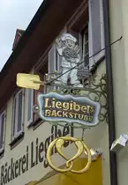 Riegel am Kaiserstuhl, Zunftschild einer B�ckerei, Feb.2013