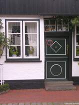 Detailansicht eines der schnen Huser der Fischesiedlung Holm in Schleswig (Schleswig-Holstein, Herbst 2009)