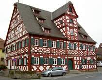 Grohabersdorf, Gasthaus zum roten Ro, reiches Sichtfachwerk, ehem. Frstenherberge, erbaut 1697 (09.02.2014)