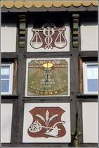 Hagen am Teutoburger Wald. Sonnenuhr an einem Fachwerkhaus in der Dorfstrae. 06.03.2014