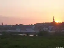 Sonnenuntergang nahe der Kirche von Kappeln, links die Holl�nderm�hle AMANDA (Kreis Schleswig-Flensburg, Schleswig-Holstein, Mai 2010)